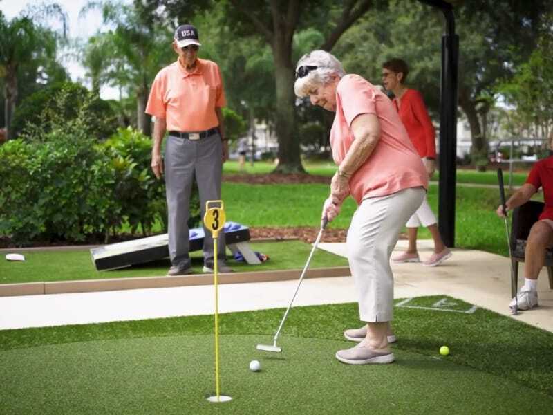 senior residents golfing